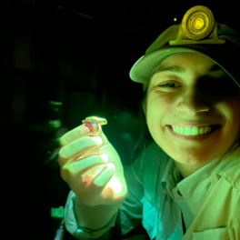 Courtney Whitcher showing her biofluorescent work 